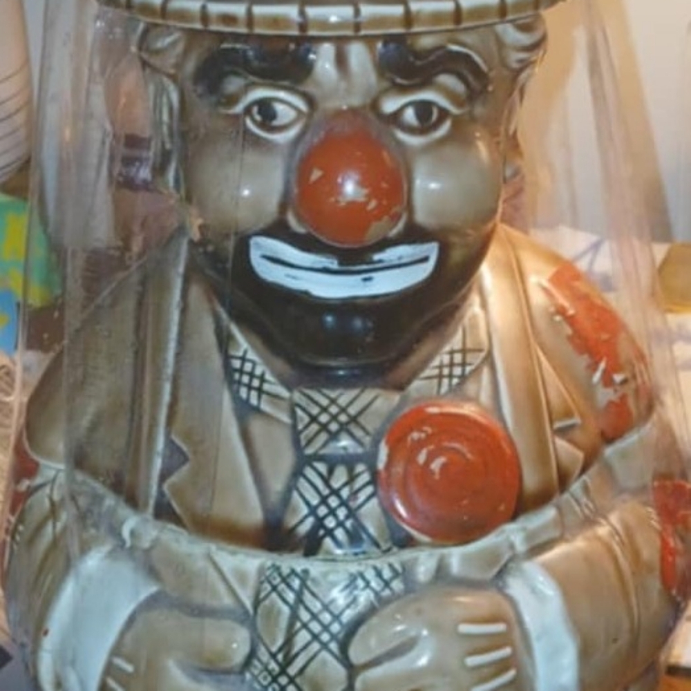 Whimsical Brown and Red Ceramic Clown Figurine